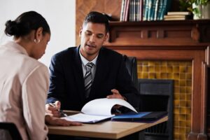 Professionals looking over documents together