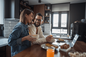 Cozy breakfast on the kitchen island with a loving couple.